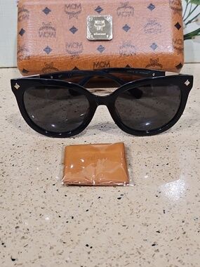 MCM Black MCM 6125 Women's Sunglasses with Brown Signature Case